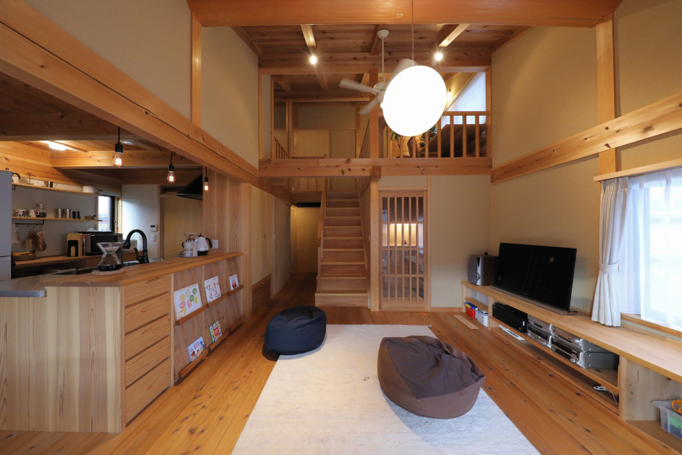 Living room - mid-sized zen open concept medium tone wood floor living room idea in Nagoya with a tv stand