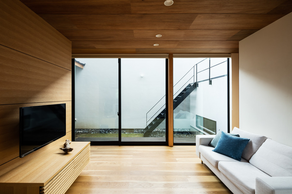 Example of a trendy living room design in Kyoto
