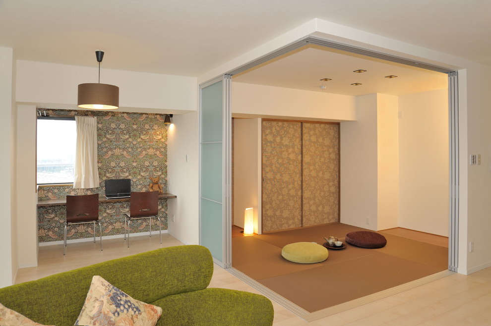 Example of a zen living room design in Other