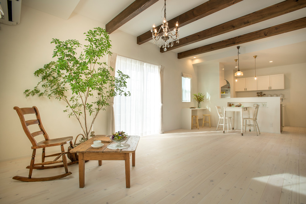 Inspiration for a zen painted wood floor and white floor living room remodel in Nagoya with white walls