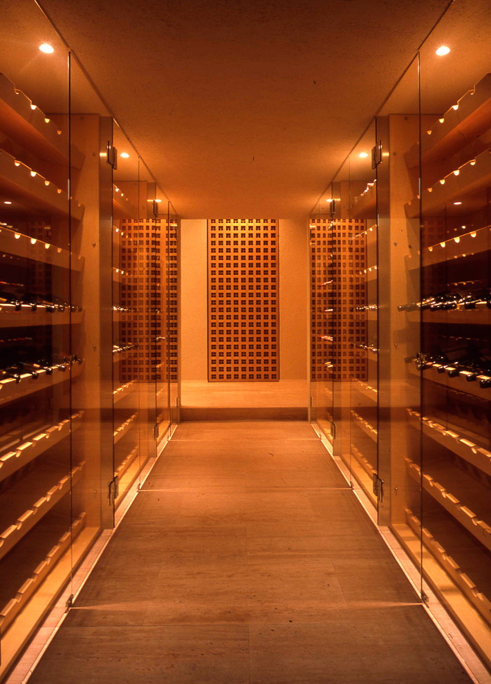 Contemporary wine cellar in Yokohama with storage racks and grey floors.
