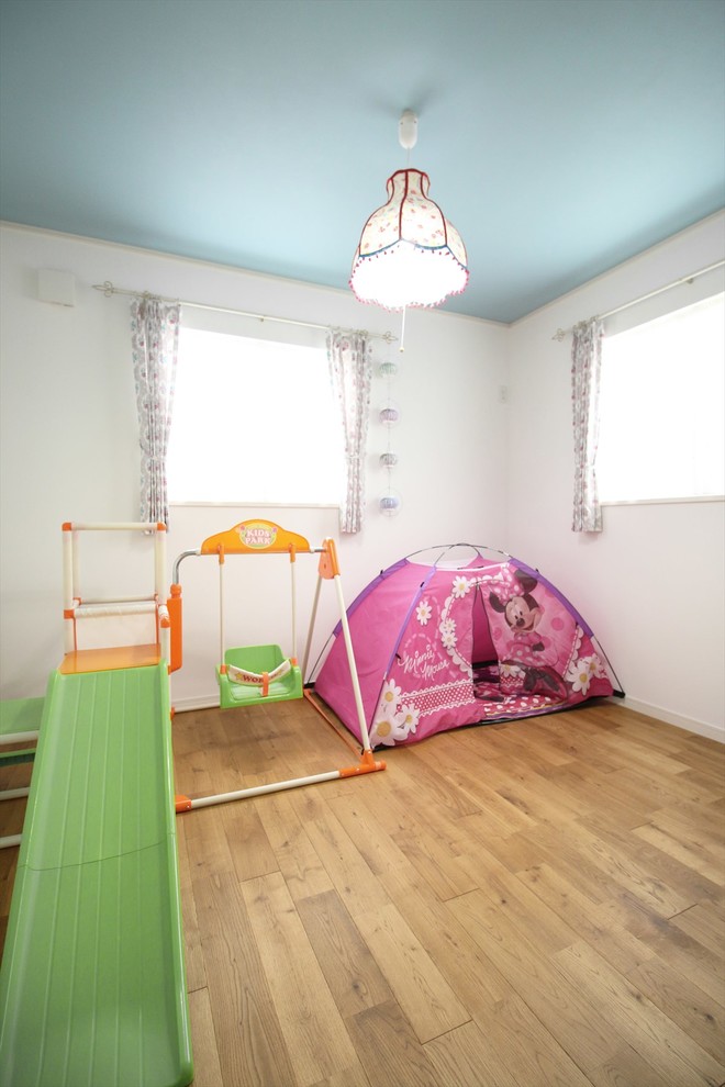 Shabby-chic style kids' bedroom in Other.