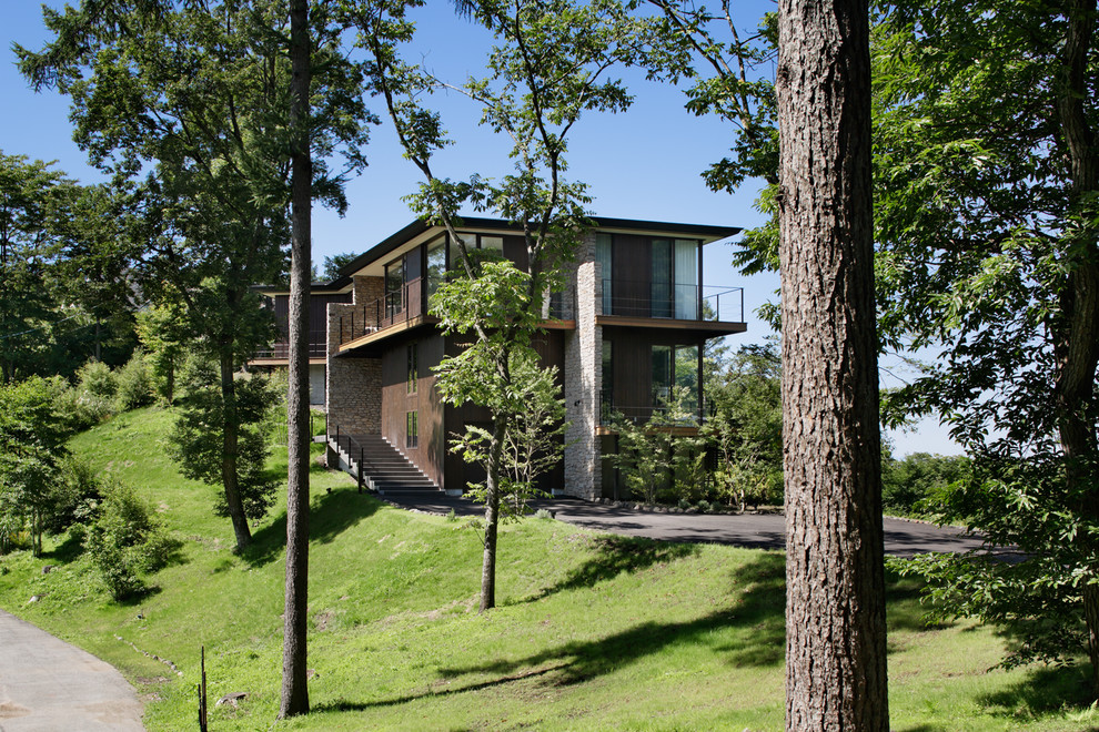 Idées déco pour une façade de maison moderne.