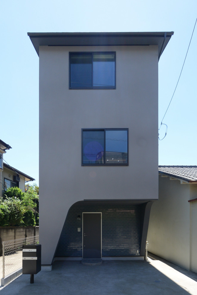 東京23区にあるモダンスタイルのおしゃれなグレーの家 (長方形) の写真