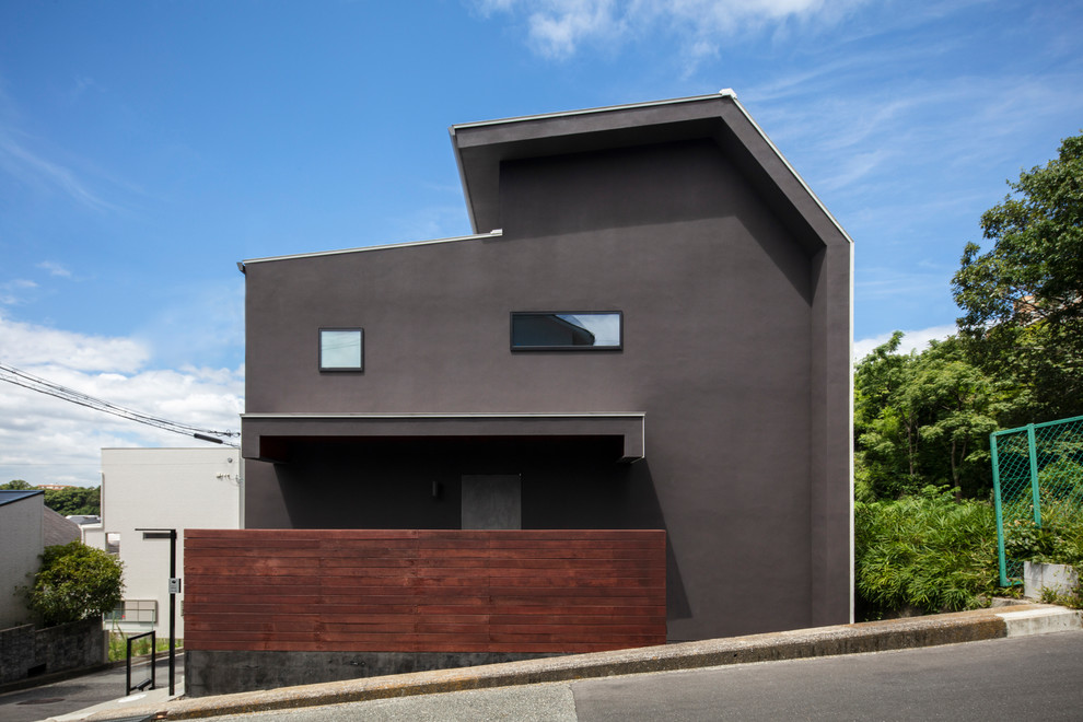 Inredning av ett modernt grått hus