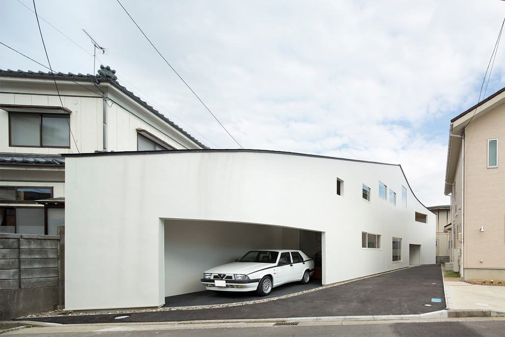 Inspiration for a white contemporary house exterior in Tokyo.