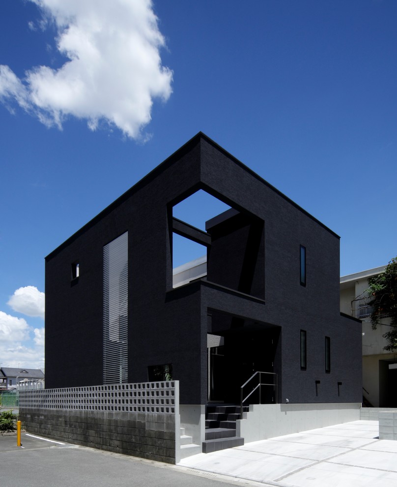 福岡にあるモダンスタイルのおしゃれな黒い外観の家の写真