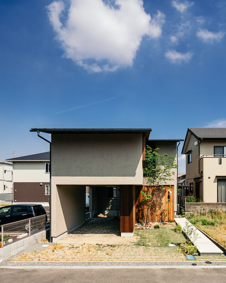 Zweistöckiges Asiatisches Einfamilienhaus mit Blechdach in Sonstige
