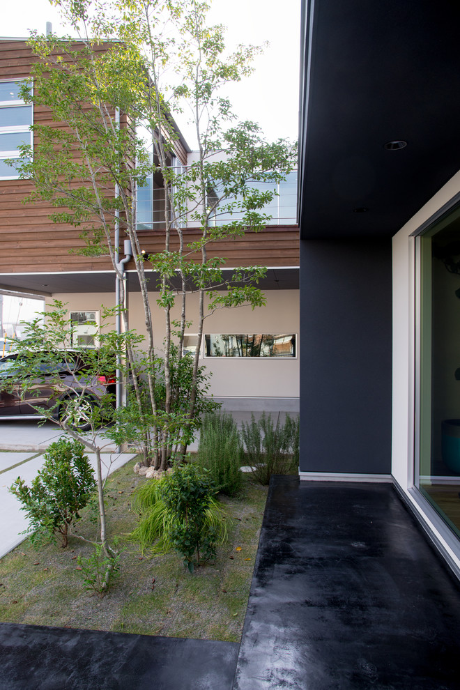 Идея дизайна: синий частный загородный дом в стиле модернизм с односкатной крышей и металлической крышей