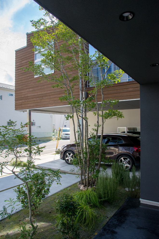 Стильный дизайн: синий частный загородный дом в стиле модернизм с односкатной крышей и металлической крышей - последний тренд