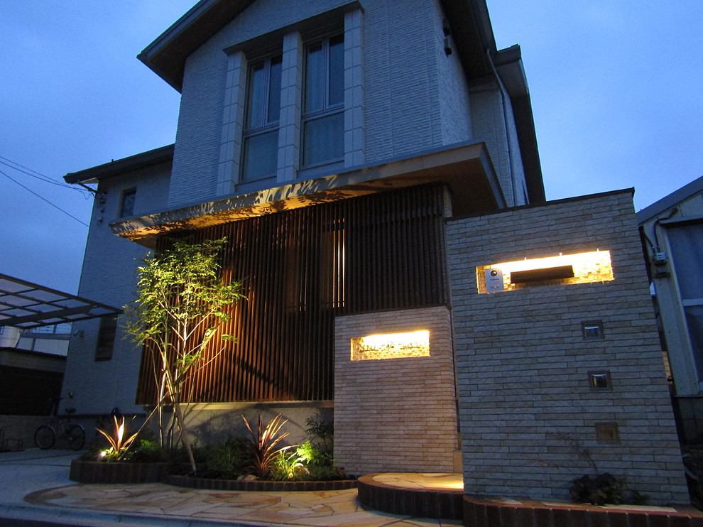 Example of a zen exterior home design in Tokyo Suburbs