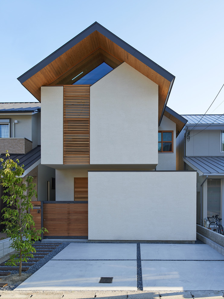 Diseño de fachada de casa beige asiática