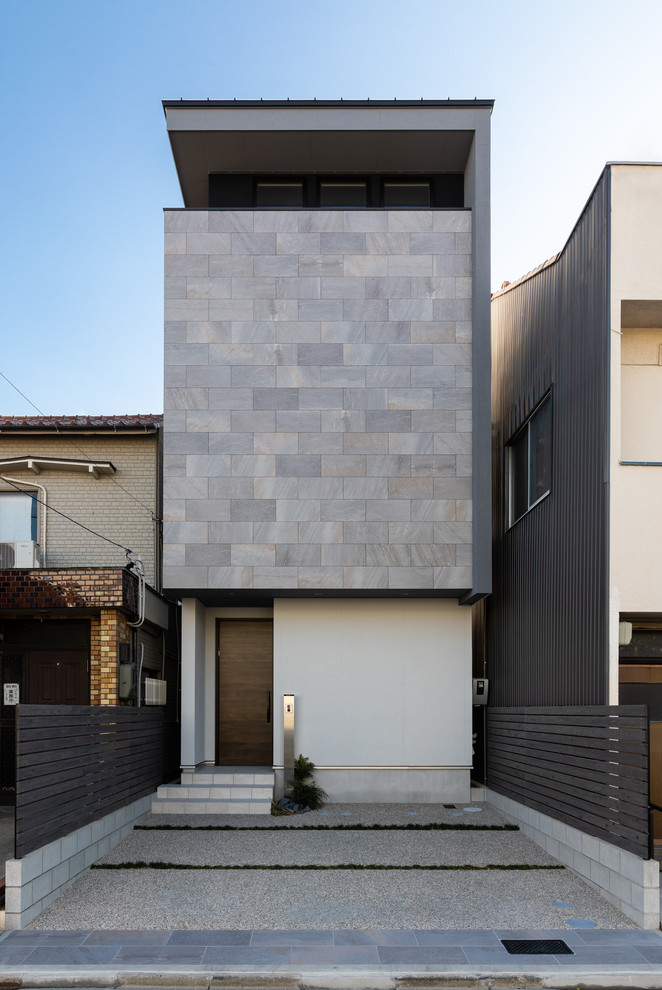 Gey modern house exterior in Nagoya.