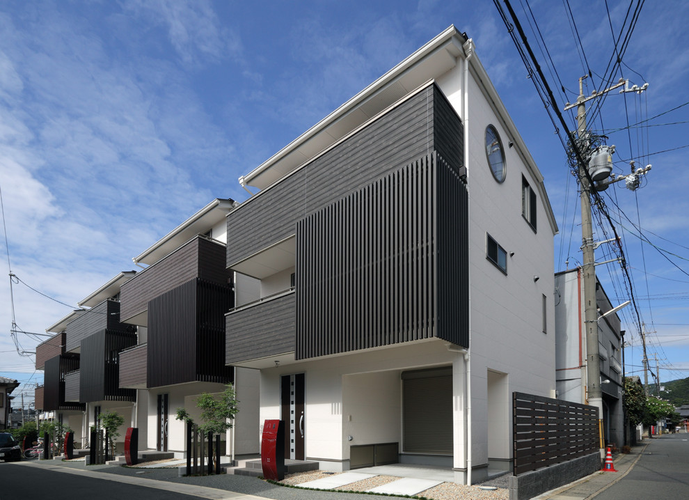 Inspiration for a world-inspired house exterior in Kyoto.