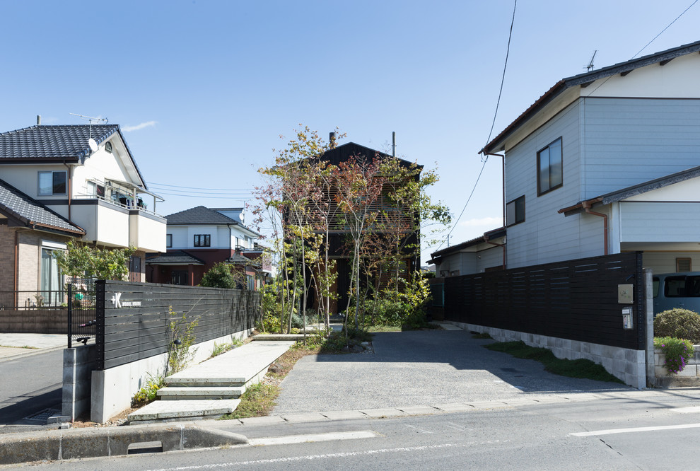 東京23区にあるアジアンスタイルのおしゃれな家の外観の写真