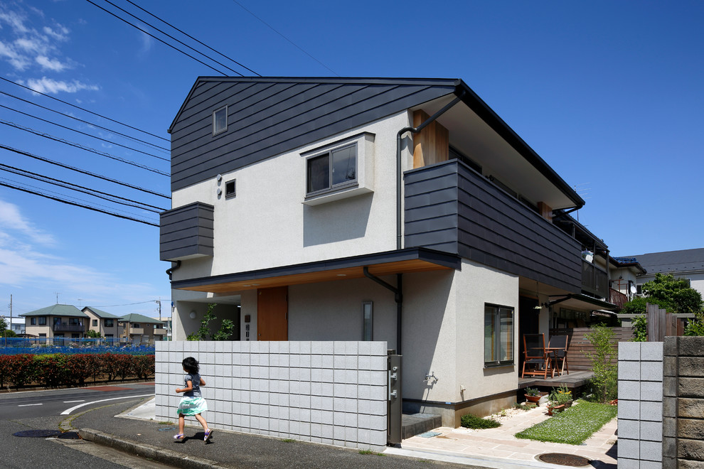 Design ideas for a world-inspired house exterior in Tokyo Suburbs.