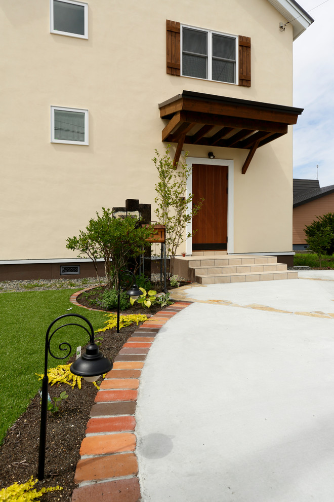 Landhaus Haus mit beiger Fassadenfarbe und Halbwalmdach in Sonstige