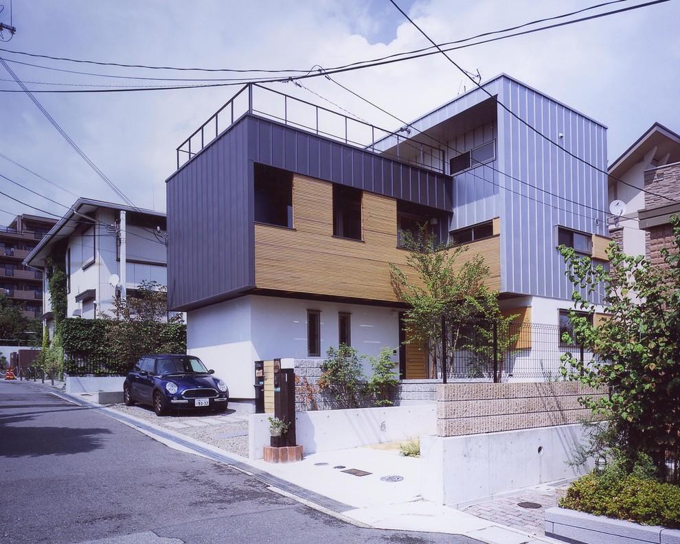 Idée de décoration pour une façade de maison minimaliste.