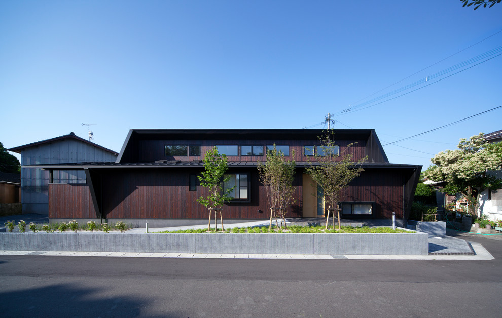 福岡にあるアジアンスタイルのおしゃれな家の外観の写真