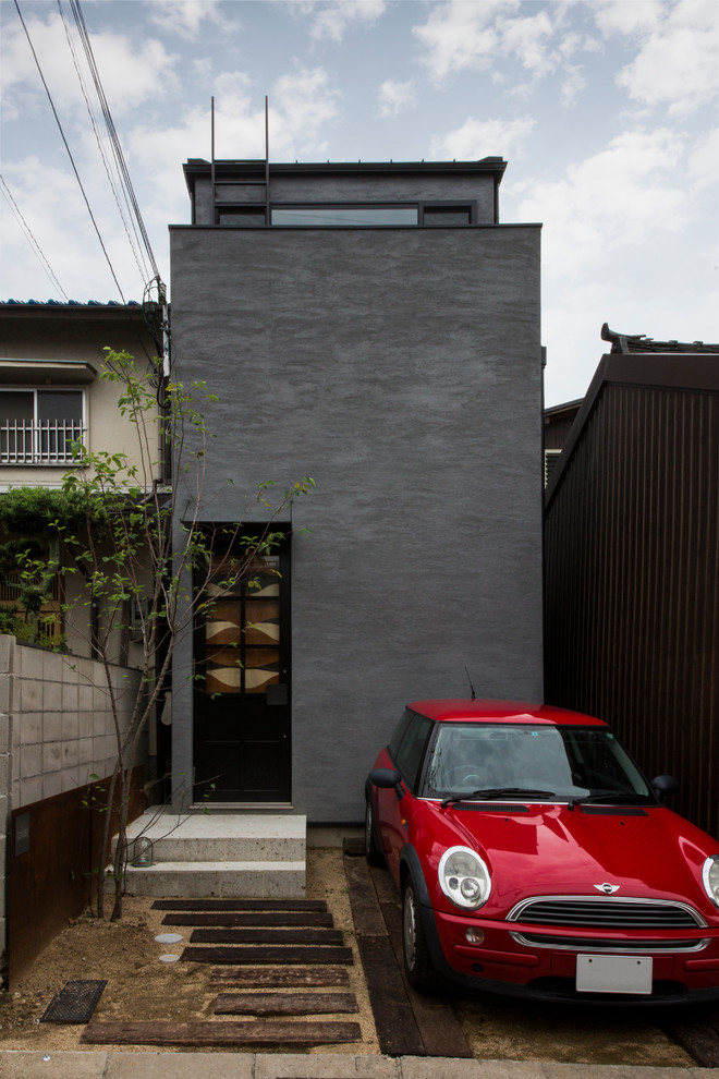 東京都下にあるコンテンポラリースタイルのおしゃれなグレーの家の写真