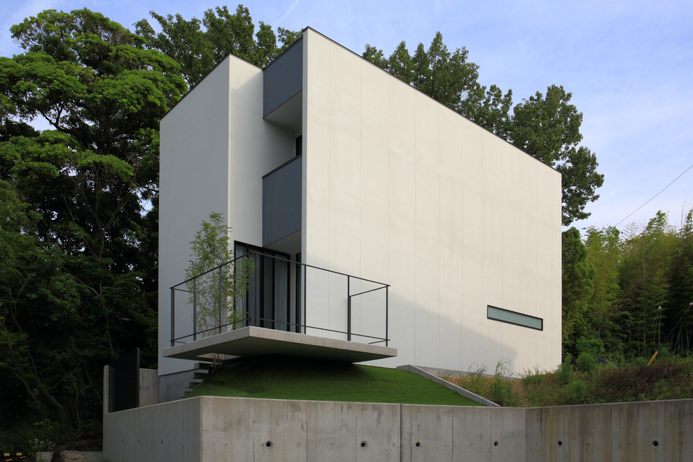 Exemple d'une façade de maison moderne.