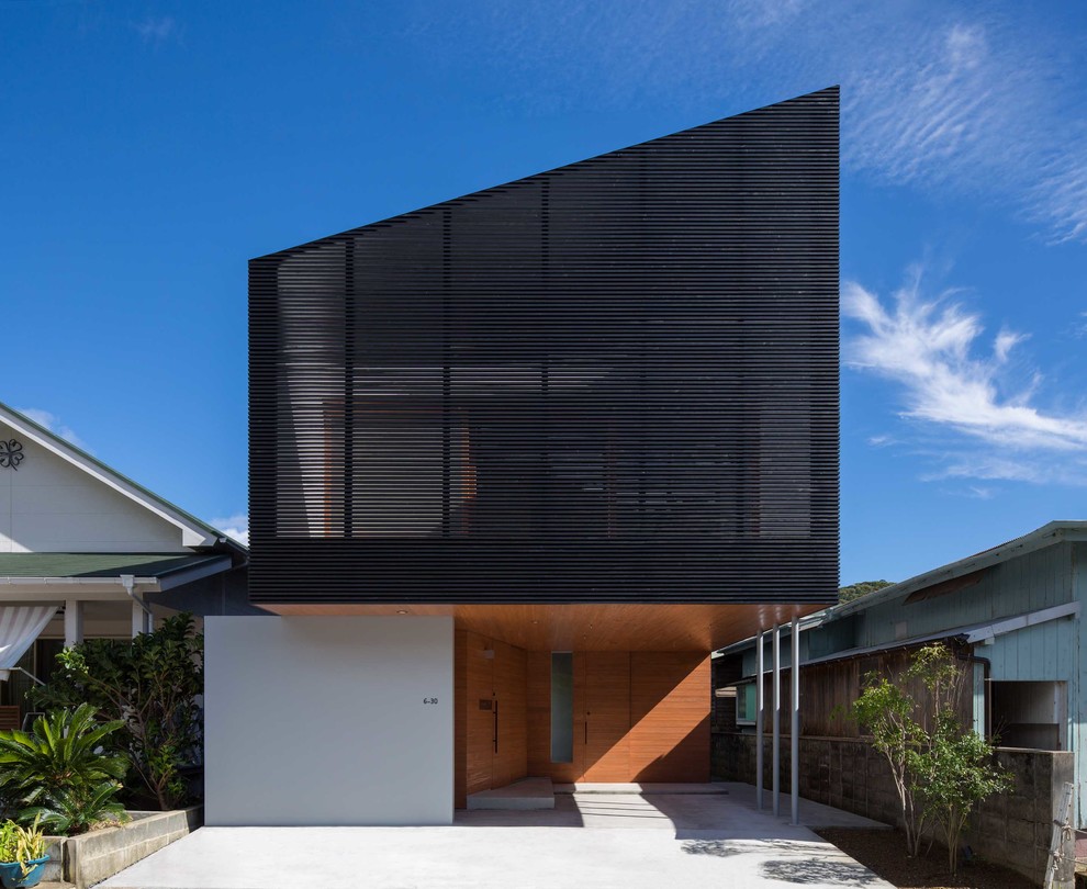Idee per la facciata di una casa nera moderna
