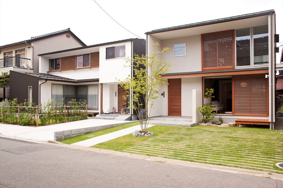 Modelo de fachada de casa blanca de estilo zen