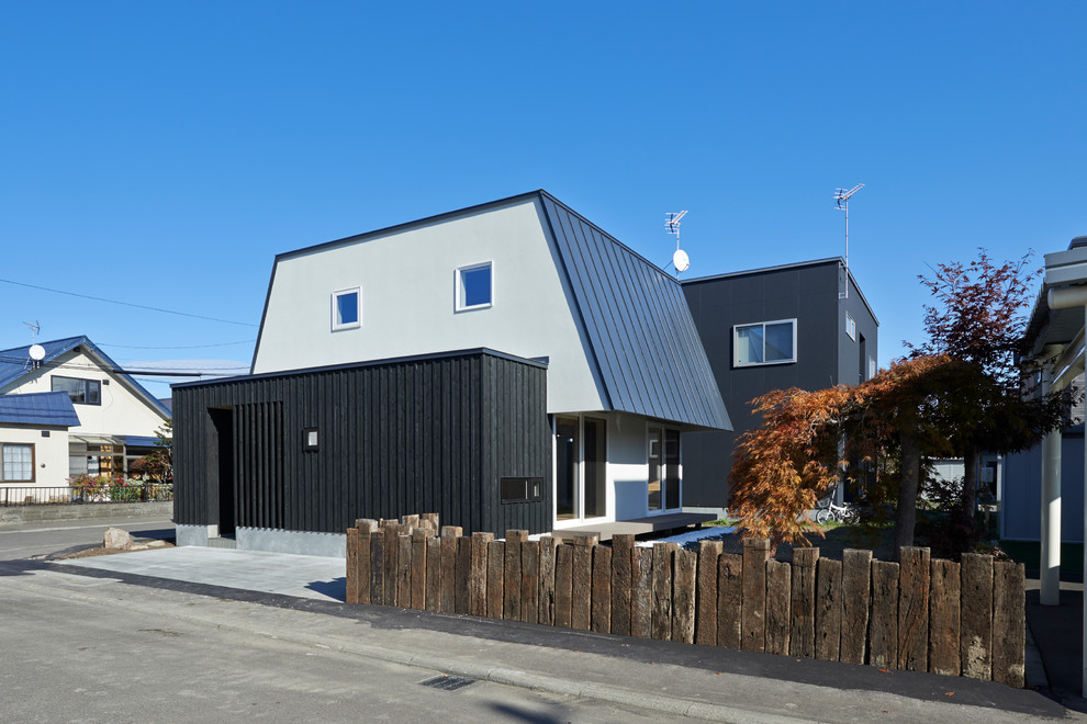 Example of a multicolored exterior home design in Sapporo