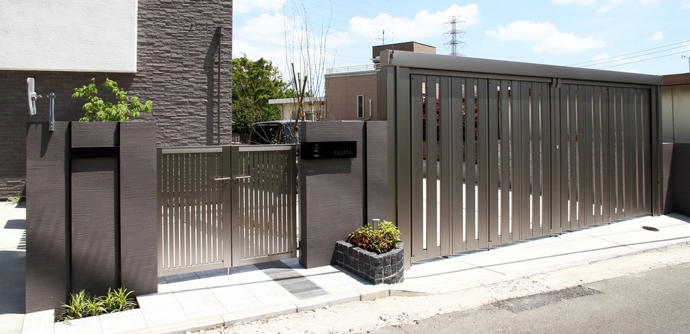 Inspiration for a gey modern two floor detached house in Yokohama.