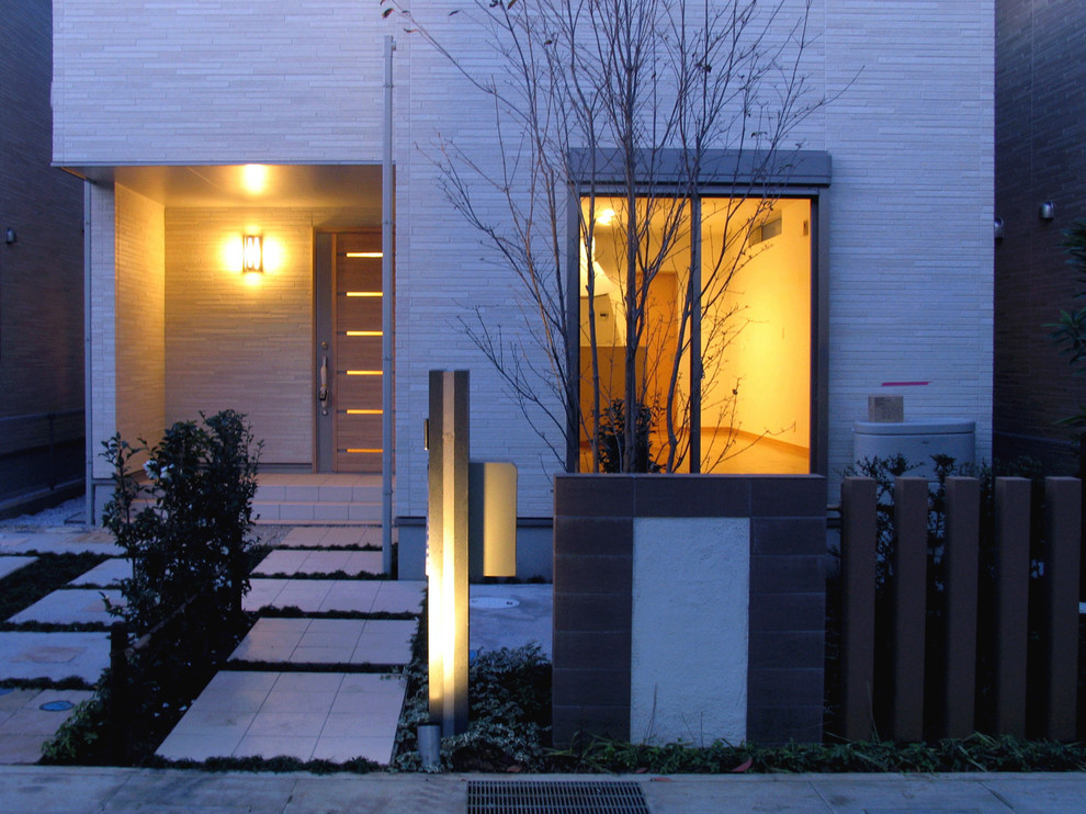 東京都下にあるお手頃価格のコンテンポラリースタイルのおしゃれな家の外観の写真