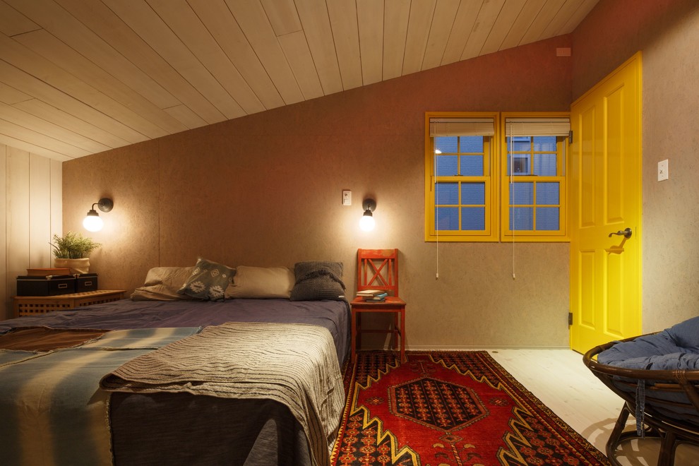 This is an example of a beach style bedroom in Other with multi-coloured walls.