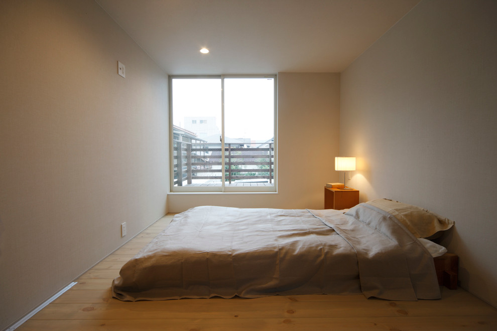 Design ideas for a modern bedroom in Osaka.