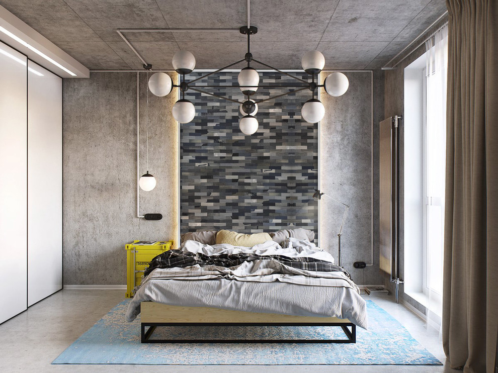 Idee per una camera da letto industriale con pareti grigie, pavimento in cemento e pavimento grigio