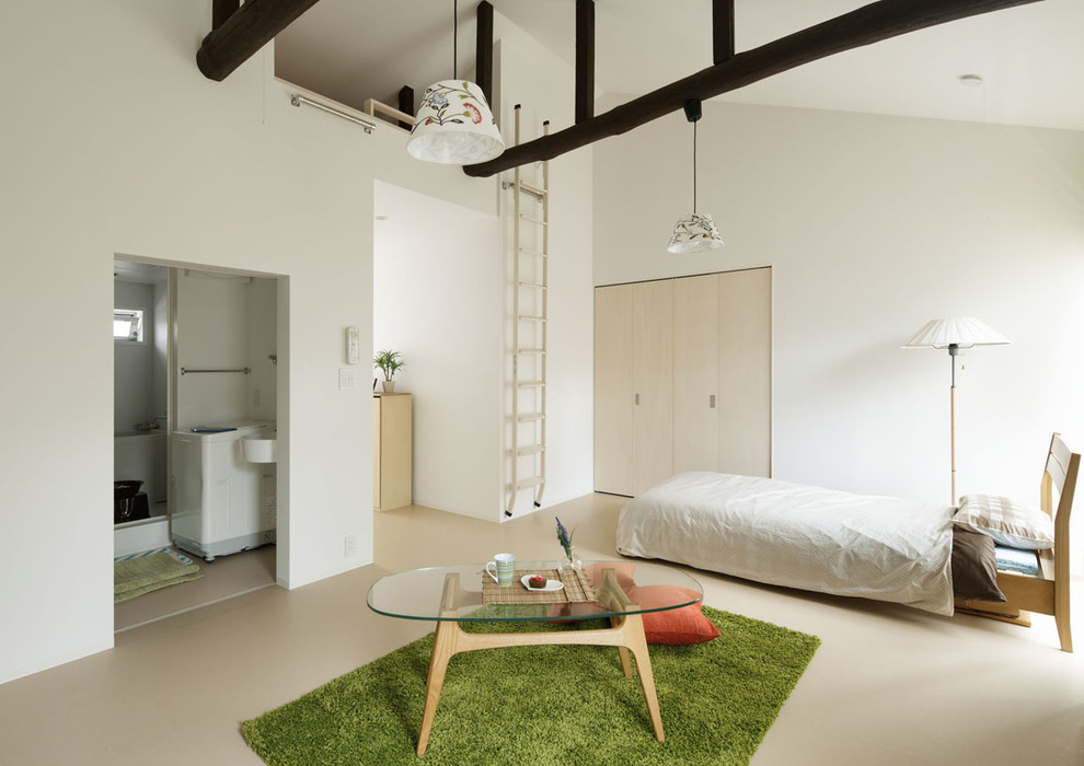 This is an example of a small scandi loft bedroom in Tokyo with white walls and no fireplace.