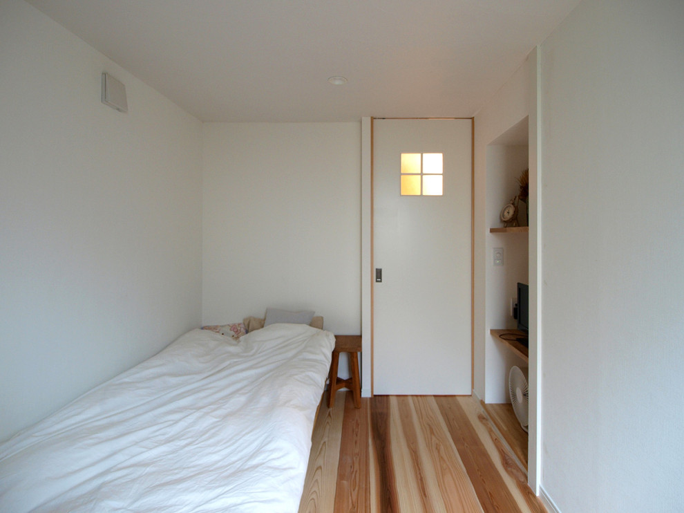 東京23区にある北欧スタイルのおしゃれな寝室のインテリア