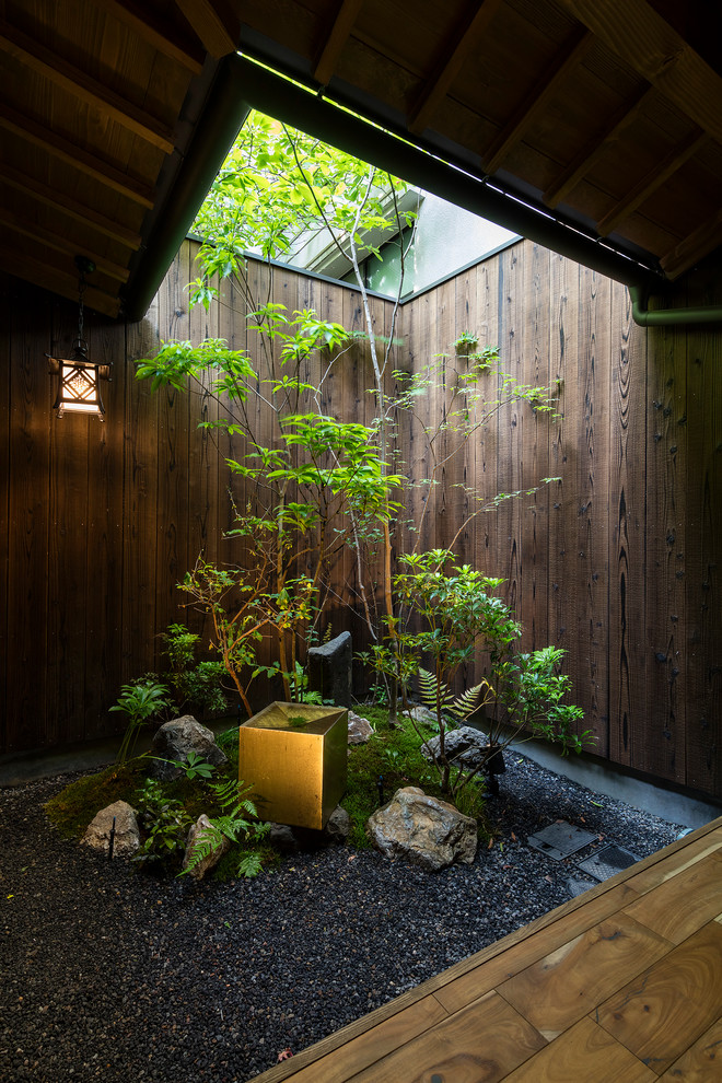 京都にあるアジアンスタイルのおしゃれな庭 (半日向) の写真