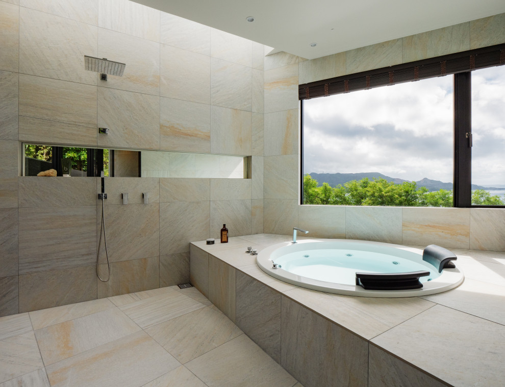 Bathroom - large master beige tile and porcelain tile bathroom idea in Other with open cabinets, beige cabinets, terrazzo countertops and beige countertops