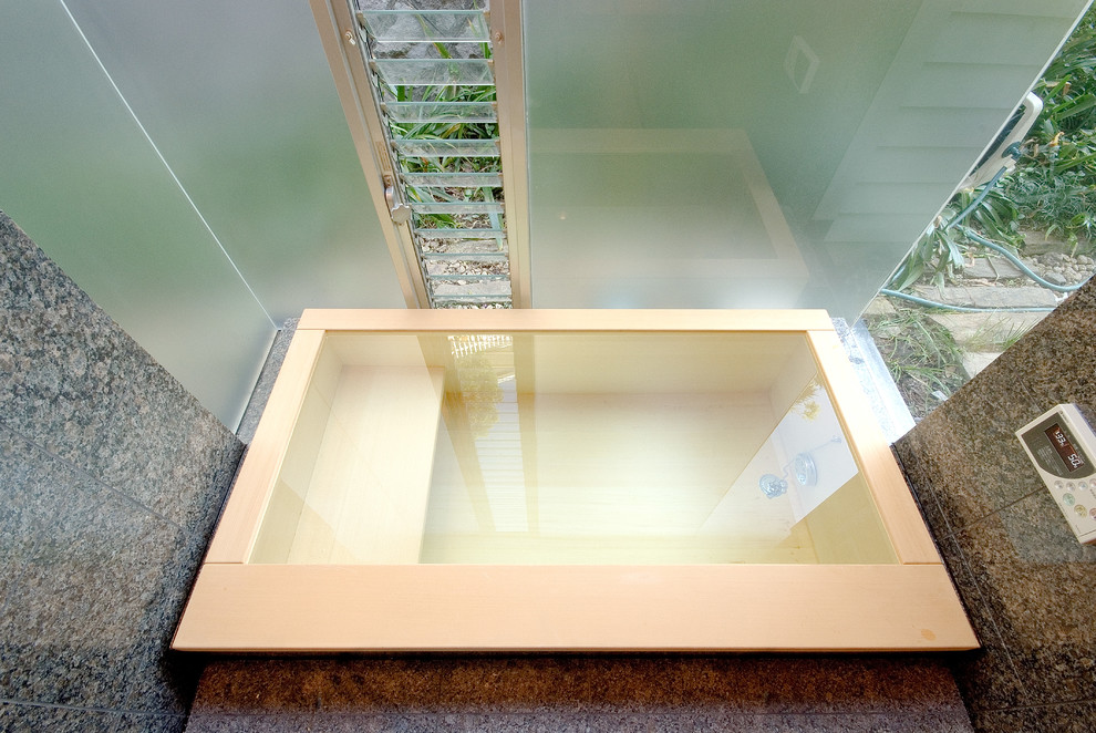 Idee per una stanza da bagno etnica con vasca giapponese