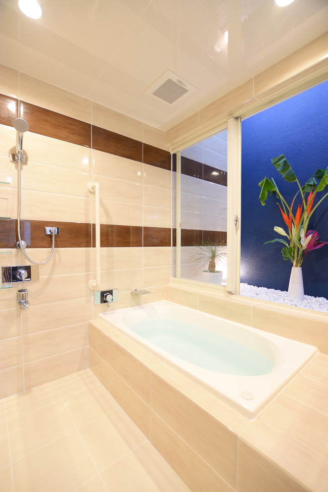 Photo of a contemporary ensuite wet room bathroom in Other with a built-in bath, beige tiles, porcelain tiles, porcelain flooring and beige floors.