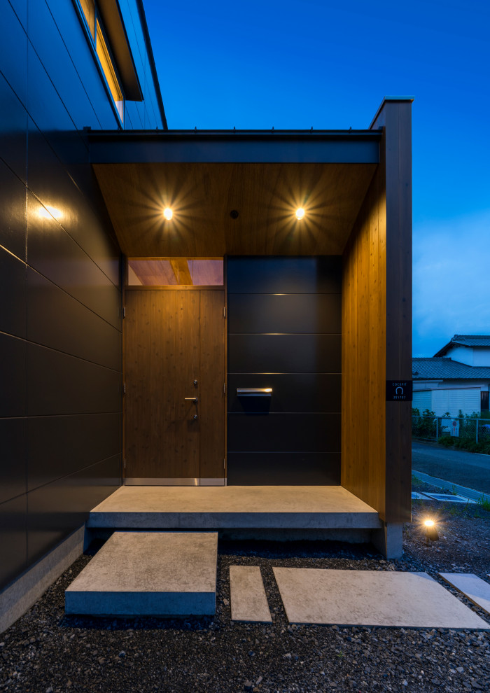 This is an example of a small scandinavian front door in Kyoto with black walls, concrete flooring, a double front door, a dark wood front door, grey floors, a wood ceiling and panelled walls.