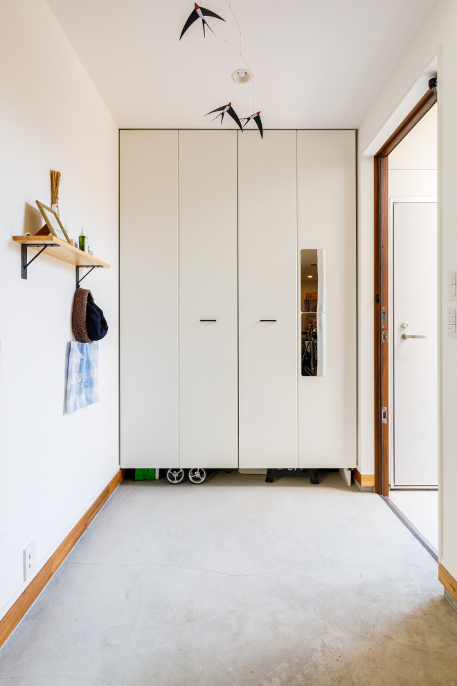 Inspiration for an industrial entryway remodel in Tokyo