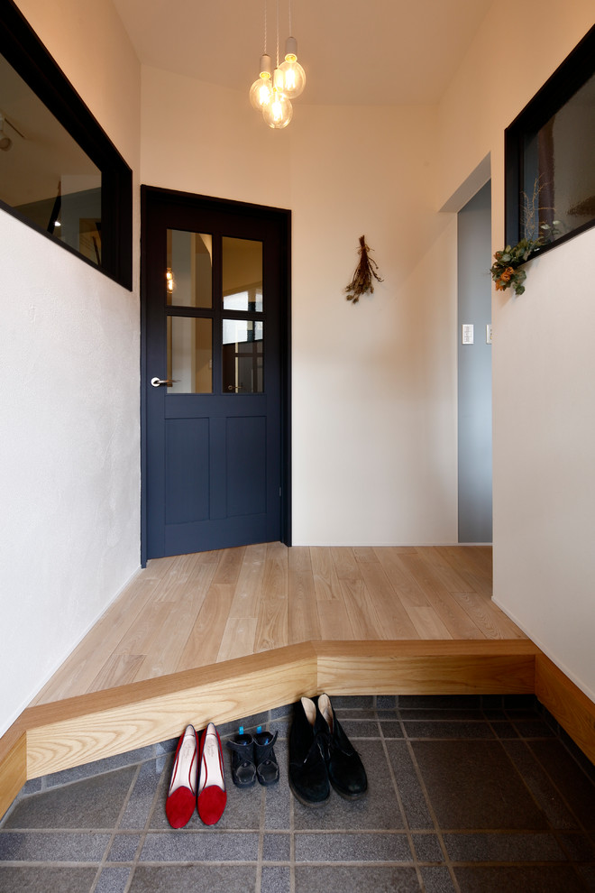 Photo of a scandi hallway in Other with white walls.