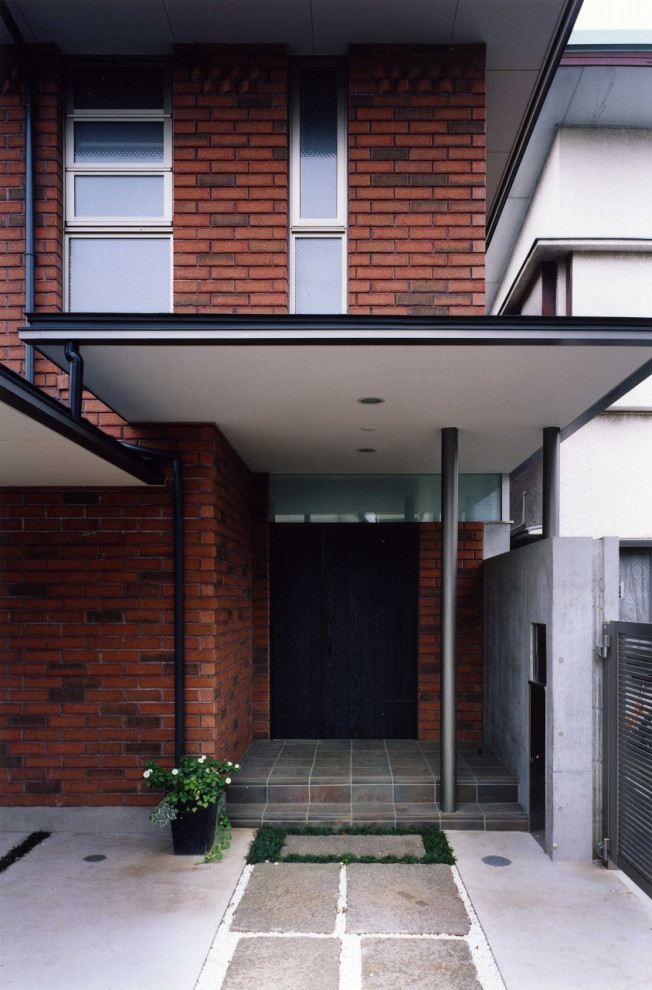 Design ideas for a medium sized rural front door in Tokyo with brown walls, porcelain flooring, a double front door, a dark wood front door, grey floors, a timber clad ceiling and brick walls.