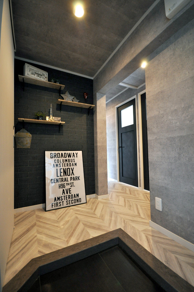 Inspiration for a modern entrance in Other with grey floors.