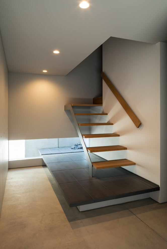 Inspiration for a large modern staircase remodel in Other