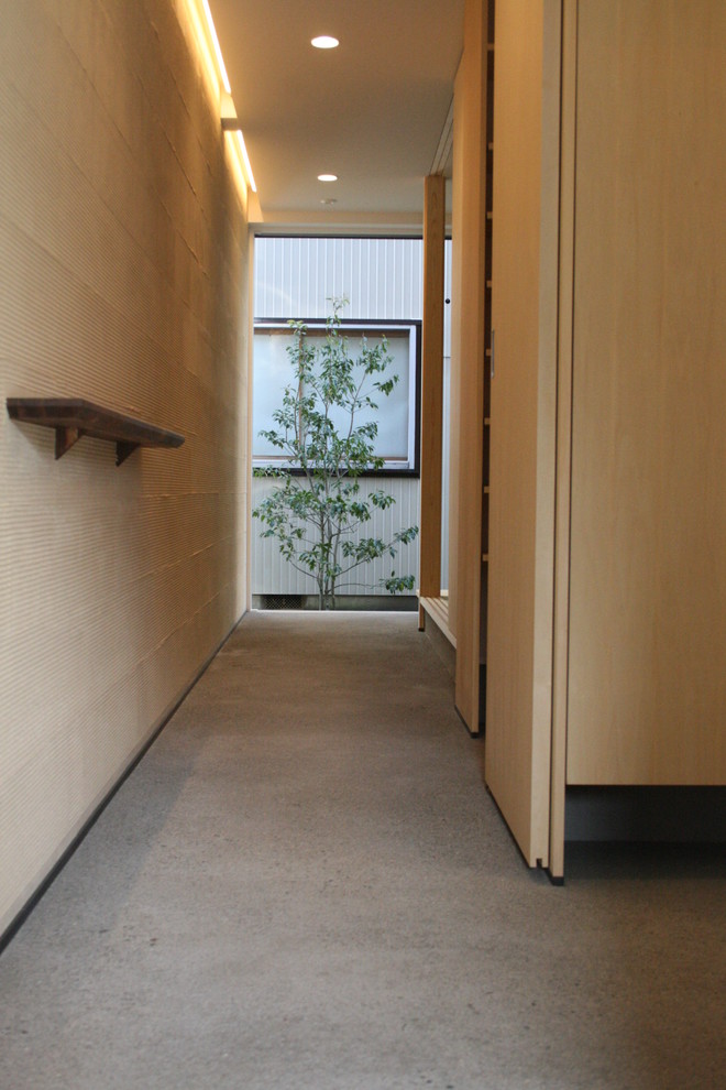 Example of a zen entryway design in Other