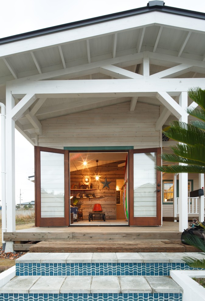 Design ideas for a beach style veranda in Other.