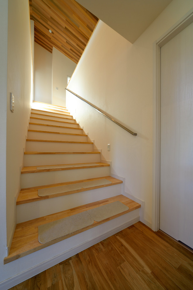 Inspiration pour un escalier droit minimaliste.