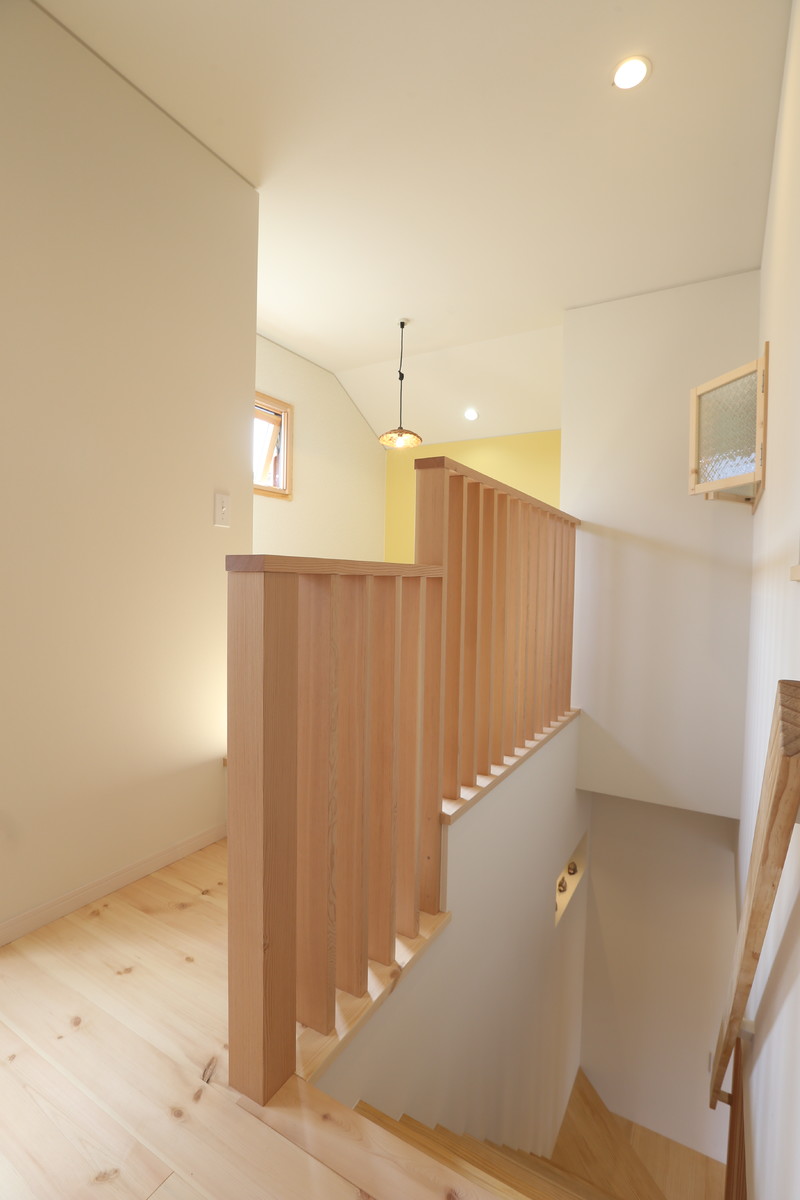 Design ideas for a scandi wood straight wood railing staircase in Other.