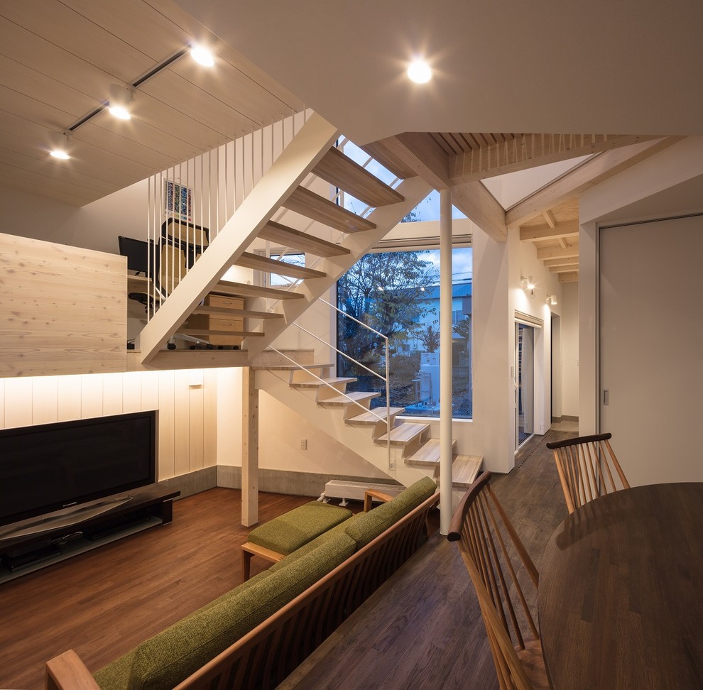 Modern staircase in Sapporo with feature lighting.